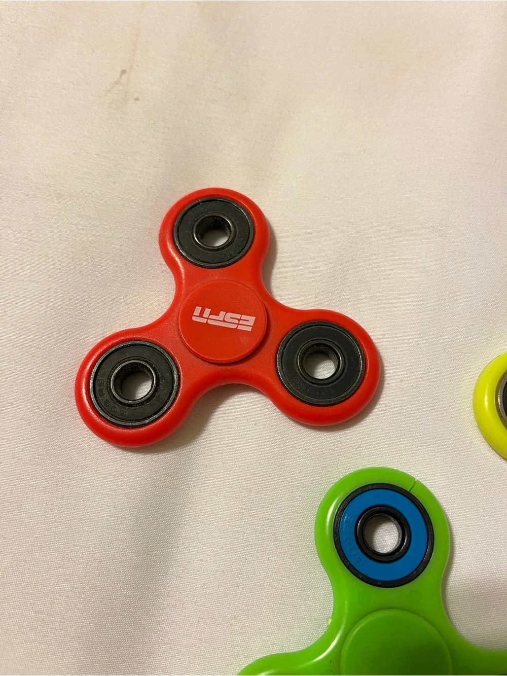 Lot of 3 Fidget Spinners ESPN Dish Network Plastic Toy Red Green Yellow